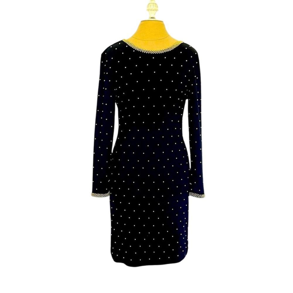 Classic , Sophisticated, Knit open back beaded dress! Size 6